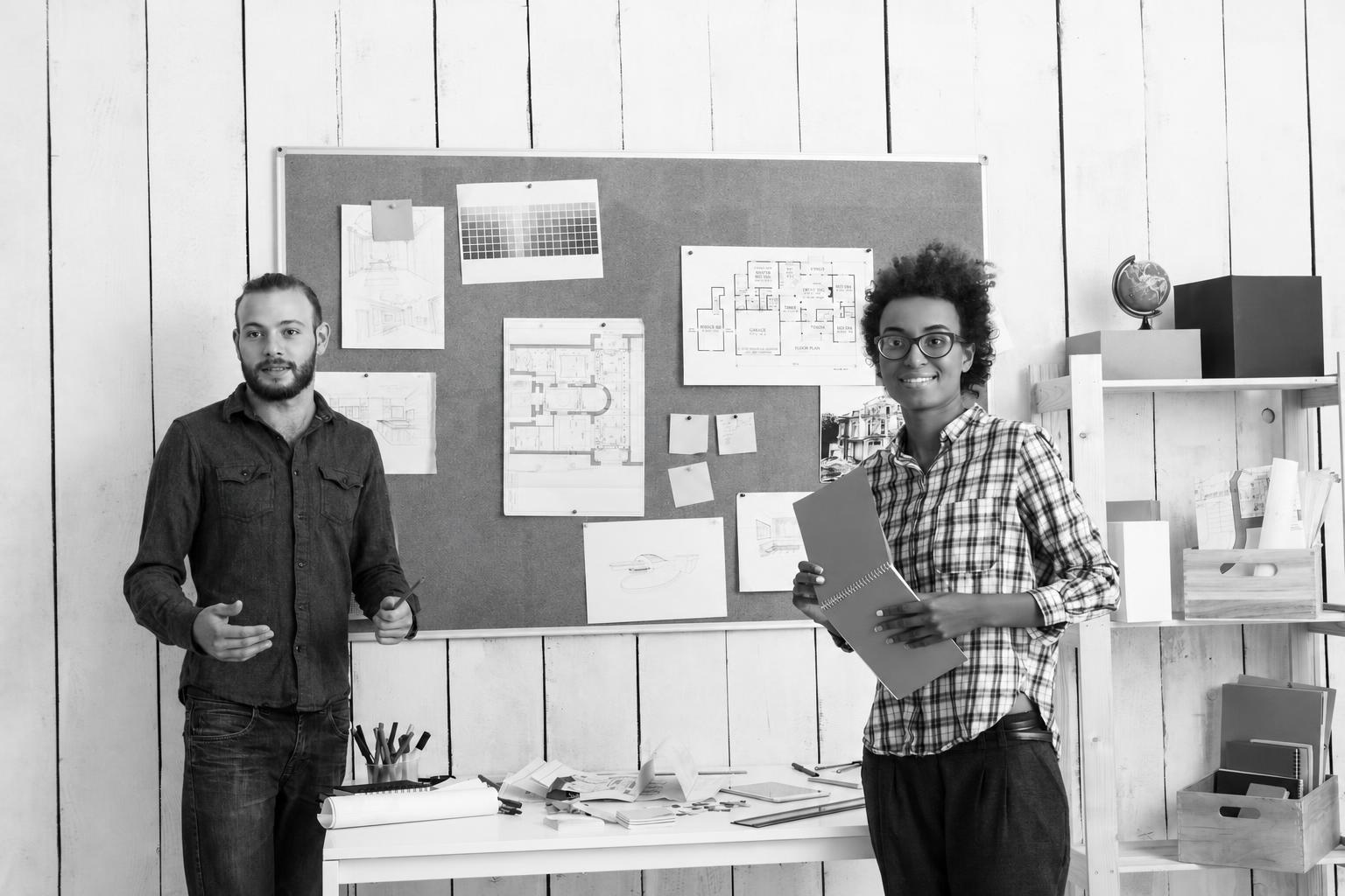 Founder mapping a product workflow on sticky notes